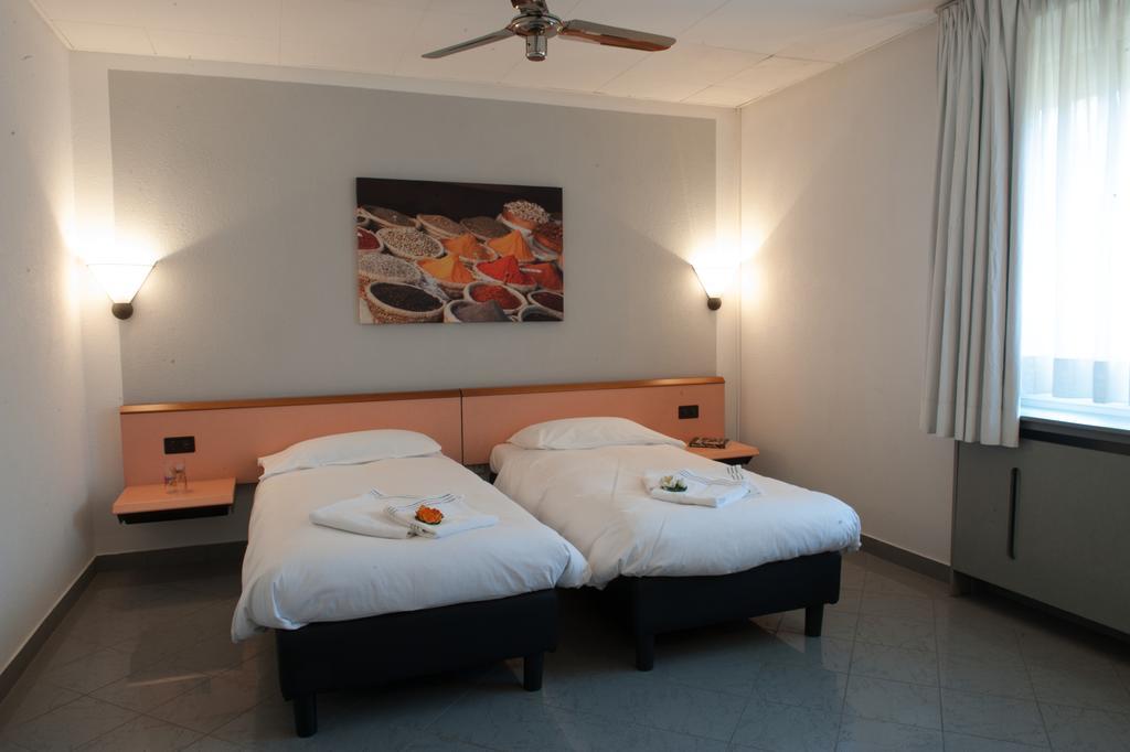 Hotel Bahnhof Haus Chiasso Buitenkant foto